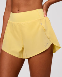 Woman wearing Pacer 3" Run Short - Lemon | Model:Charli | Size:XS | Thumbnail Index: 0