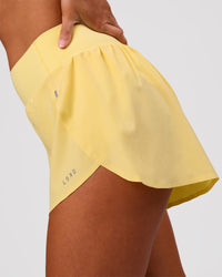 Woman wearing Pacer 3" Run Short - Lemon | Model:Charli | Size:XS | Thumbnail Index: 4
