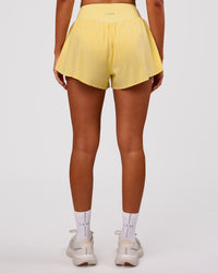 Woman wearing Pacer 3" Run Short - Lemon | Model:Charli | Size:XS | Thumbnail Index: 6