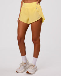Woman wearing Pacer 3" Run Short - Lemon | Model:Charli | Size:XS | Thumbnail Index: 10