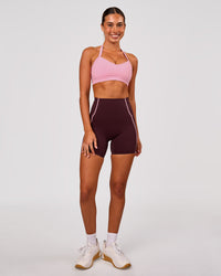 Woman wearing Power Ultra High-Rise 6" Short Pockets - Cherry Lacquer-Pink Rose | Model:Charli | Size:XS | Thumbnail Index: 6