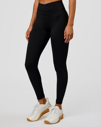 Woman wearing Solstice High-Rise Full Length Legging - Black | Model:Charli | Size:XS | Thumbnail Index: 2