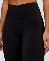 Woman wearing Solstice High-Rise Full Length Legging - Black | Model:Charli | Size:XS | Thumbnail Index: 1