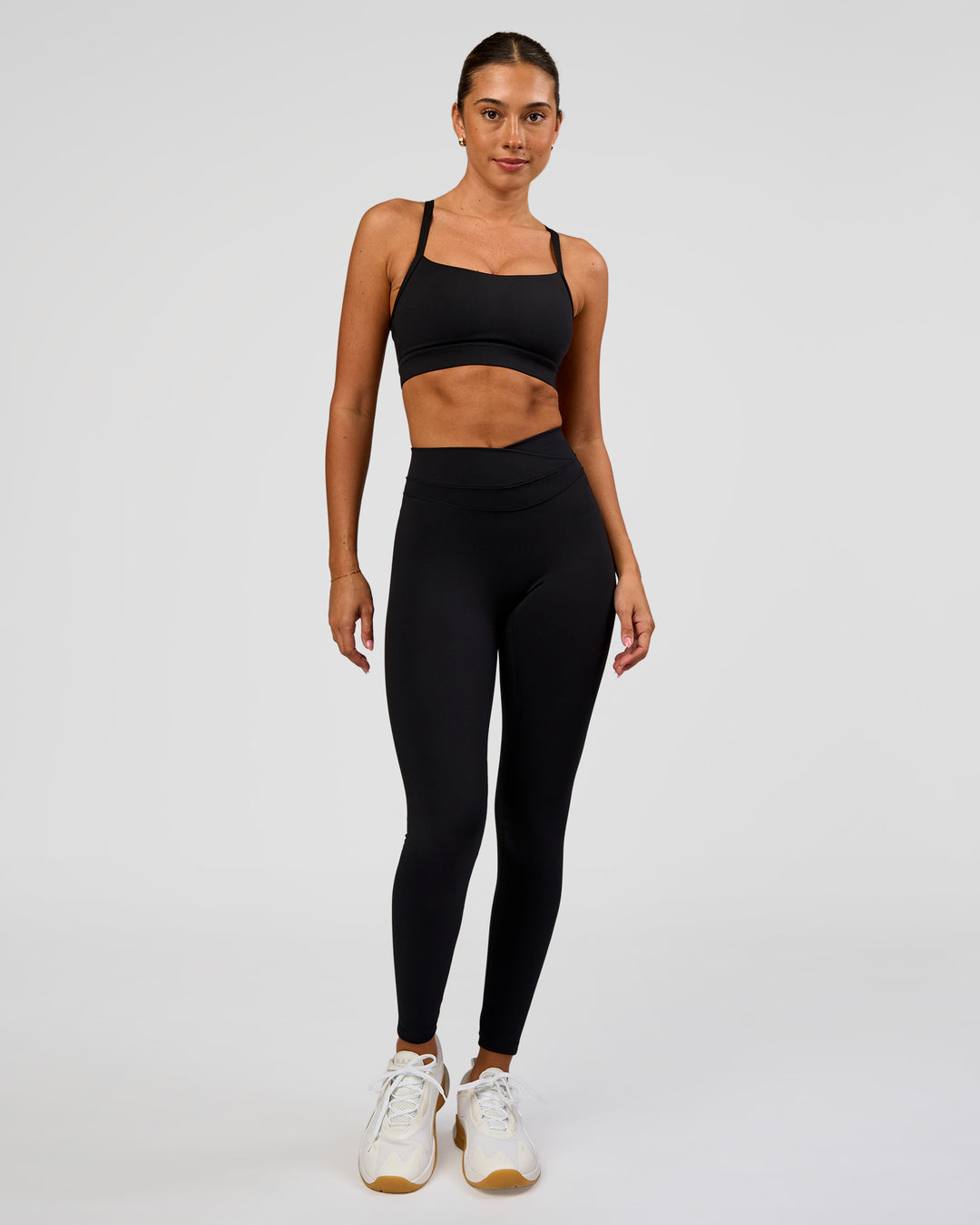 Woman wearing Solstice High-Rise Full Length Legging - Black | Model:Charli | Size:XS - view 6