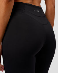 Woman wearing Solstice High-Rise Full Length Legging - Black | Model:Charli | Size:XS | Thumbnail Index: 3