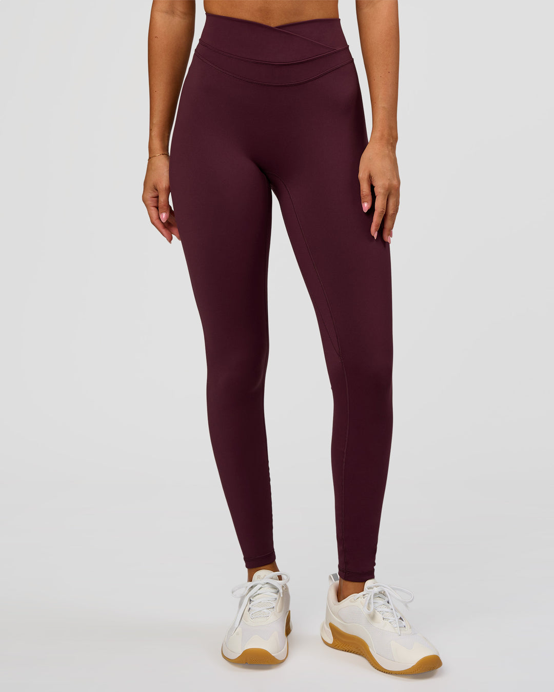 Woman wearing Solstice High-Rise Full Length Legging - Cherry Lacquer | Model:Charli | Size:XS - view 1