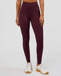 Woman wearing Solstice High-Rise Full Length Legging - Cherry Lacquer | Model:Charli | Size:XS | Thumbnail Index: 0