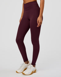 Woman wearing Solstice High-Rise Full Length Legging - Cherry Lacquer | Model:Charli | Size:XS | Thumbnail Index: 1