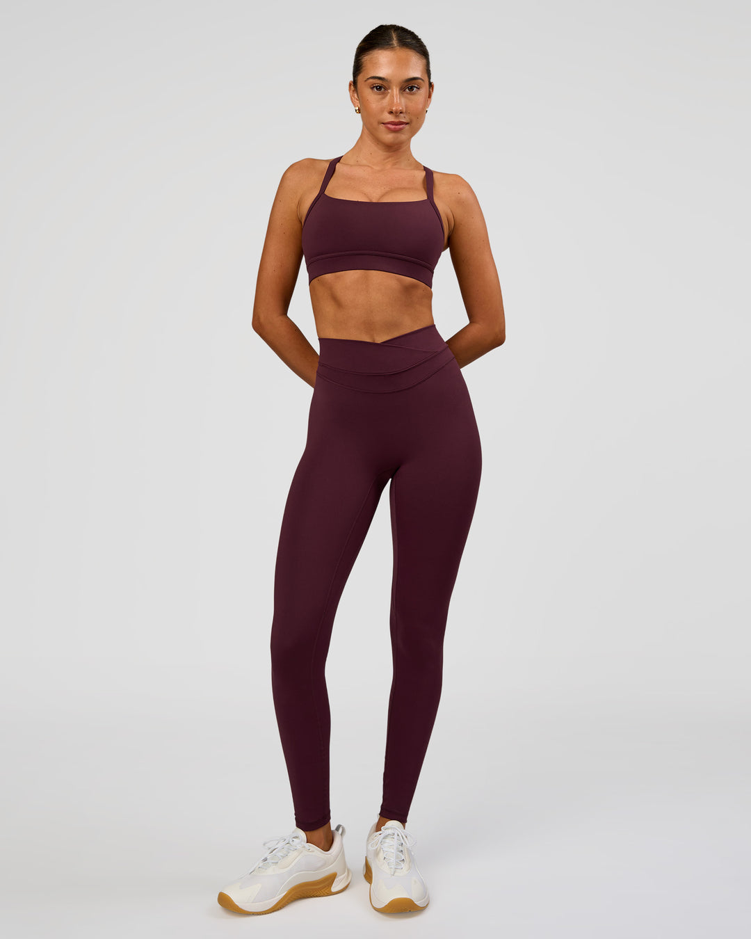 Woman wearing Solstice High-Rise Full Length Legging - Cherry Lacquer | Model:Charli | Size:XS - view 3