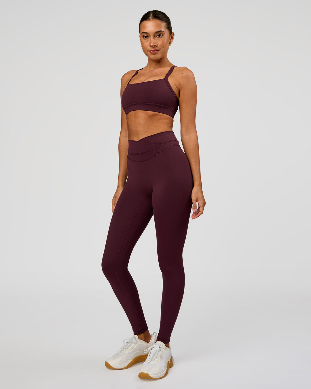 Woman wearing Solstice High-Rise Full Length Legging - Cherry Lacquer | Model:Charli | Size:XS - view 4