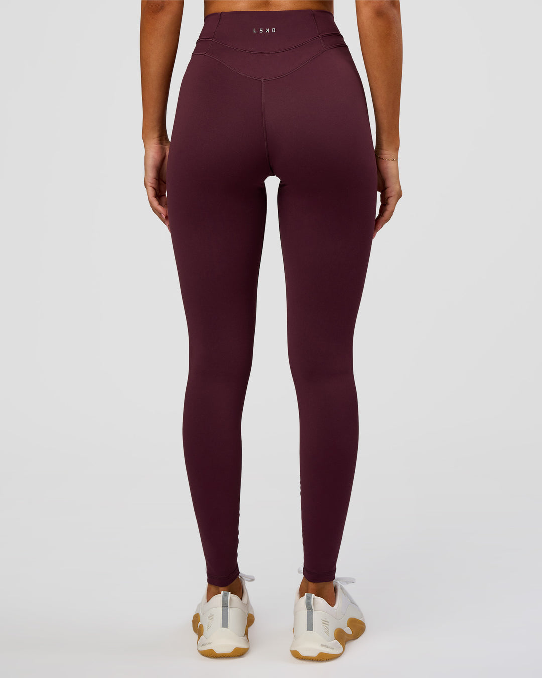 Woman wearing Solstice High-Rise Full Length Legging - Cherry Lacquer | Model:Charli | Size:XS - view 6
