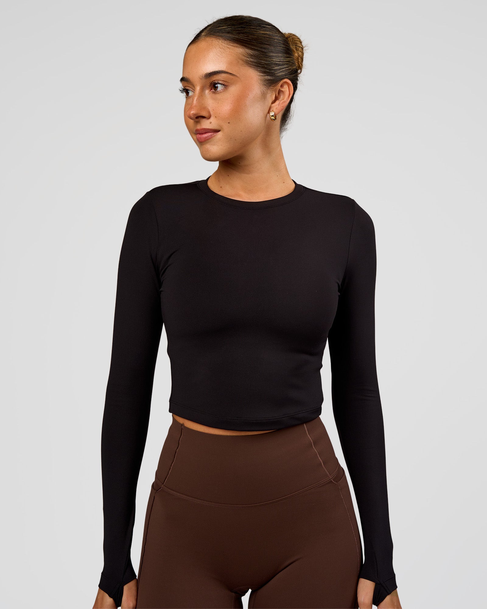 Woman wearing Staple Long Sleeve Cropped Tee 2.0 - Black | Model:Charli | Size:XS