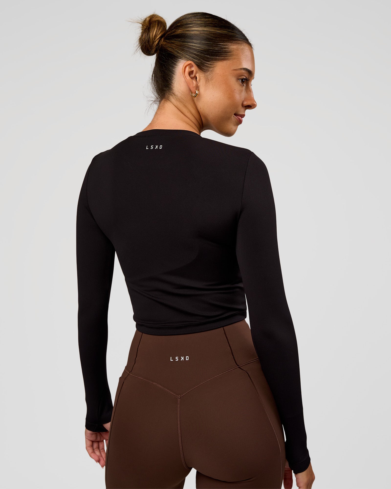 Woman wearing Staple Long Sleeve Cropped Tee 2.0 - Black | Model:Charli | Size:XS