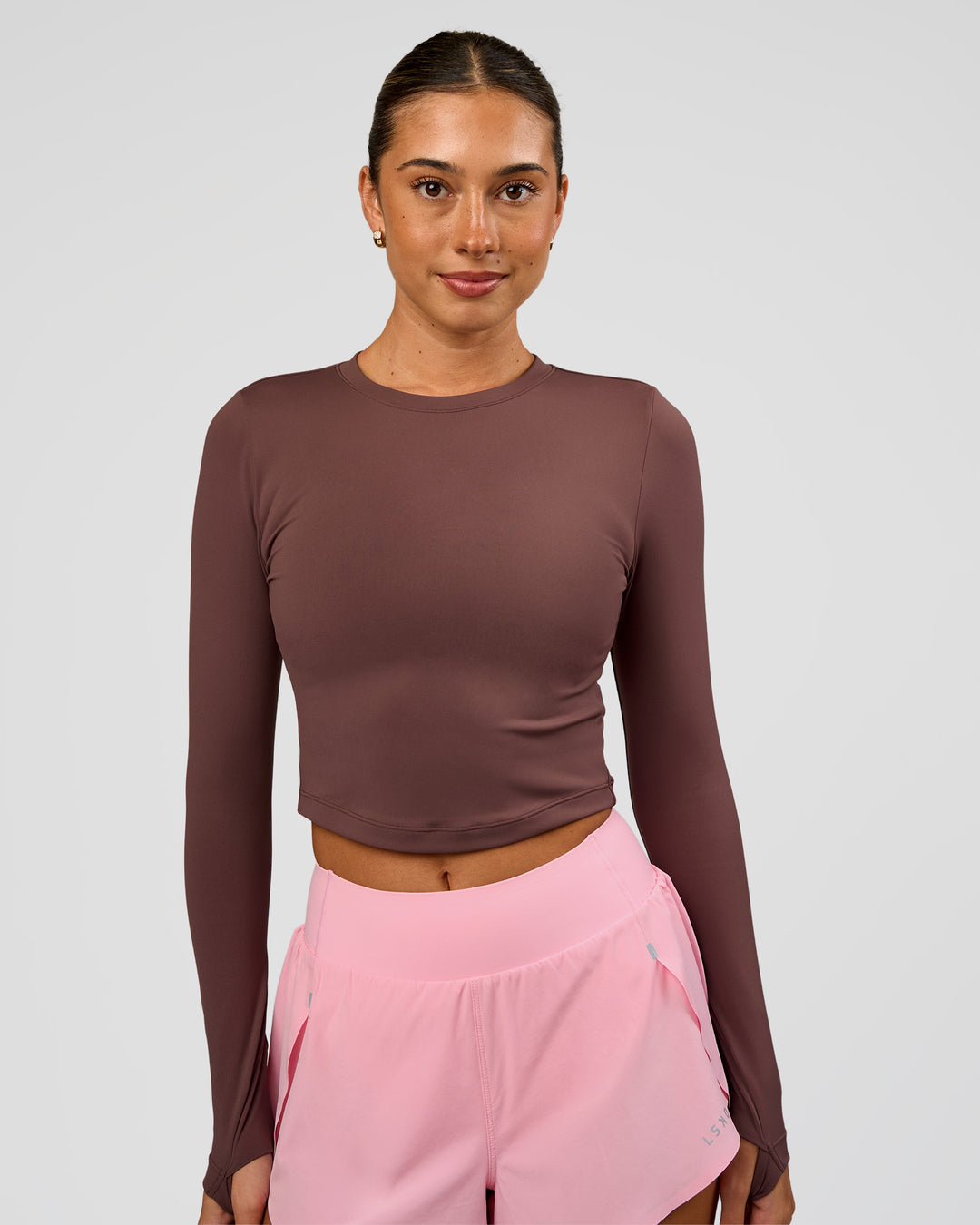 Woman wearing Staple Long Sleeve Cropped Tee 2.0 - Cocoa Powder | Model:Charli | Size:XS - view 1