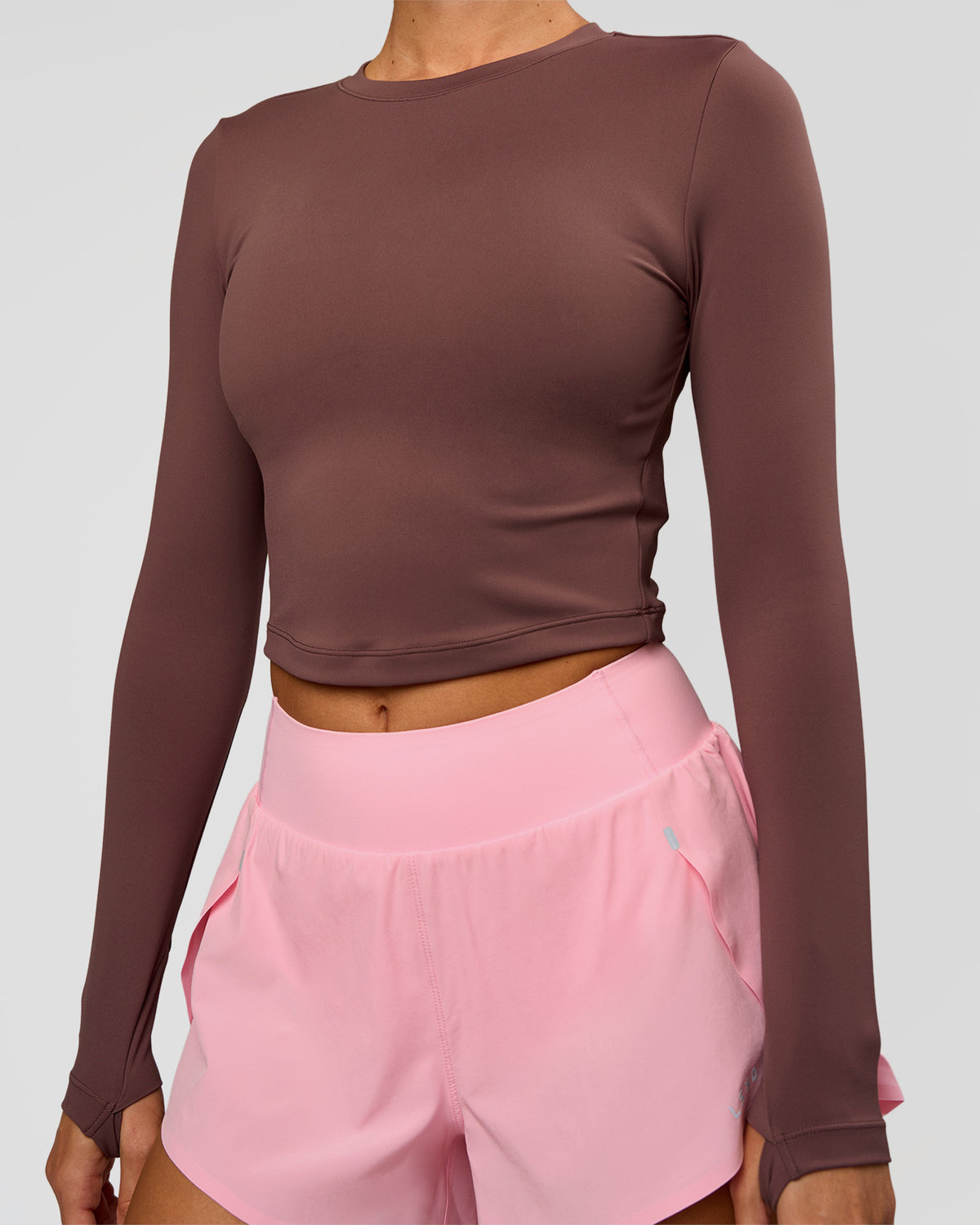 Woman wearing Staple Long Sleeve Cropped Tee 2.0 - Cocoa Powder | Model:Charli | Size:XS