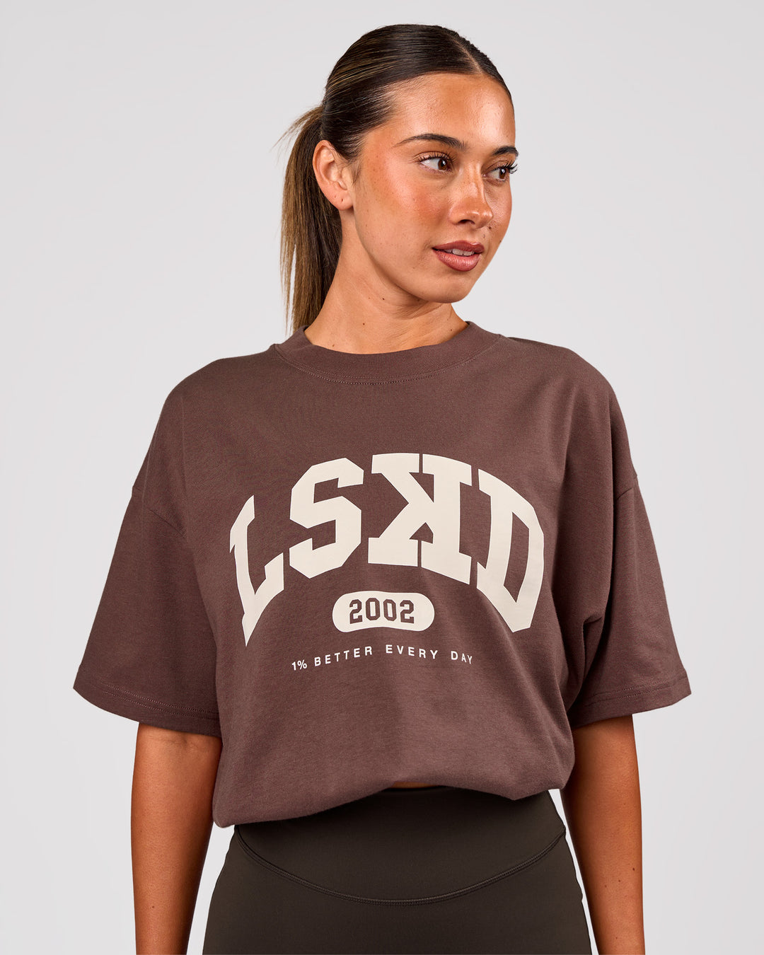 Woman wearing Varsity EST Heavyweight Oversized Tee  - Cocoa Powder-Off White | Model:Charli | Size:XS - view 7
