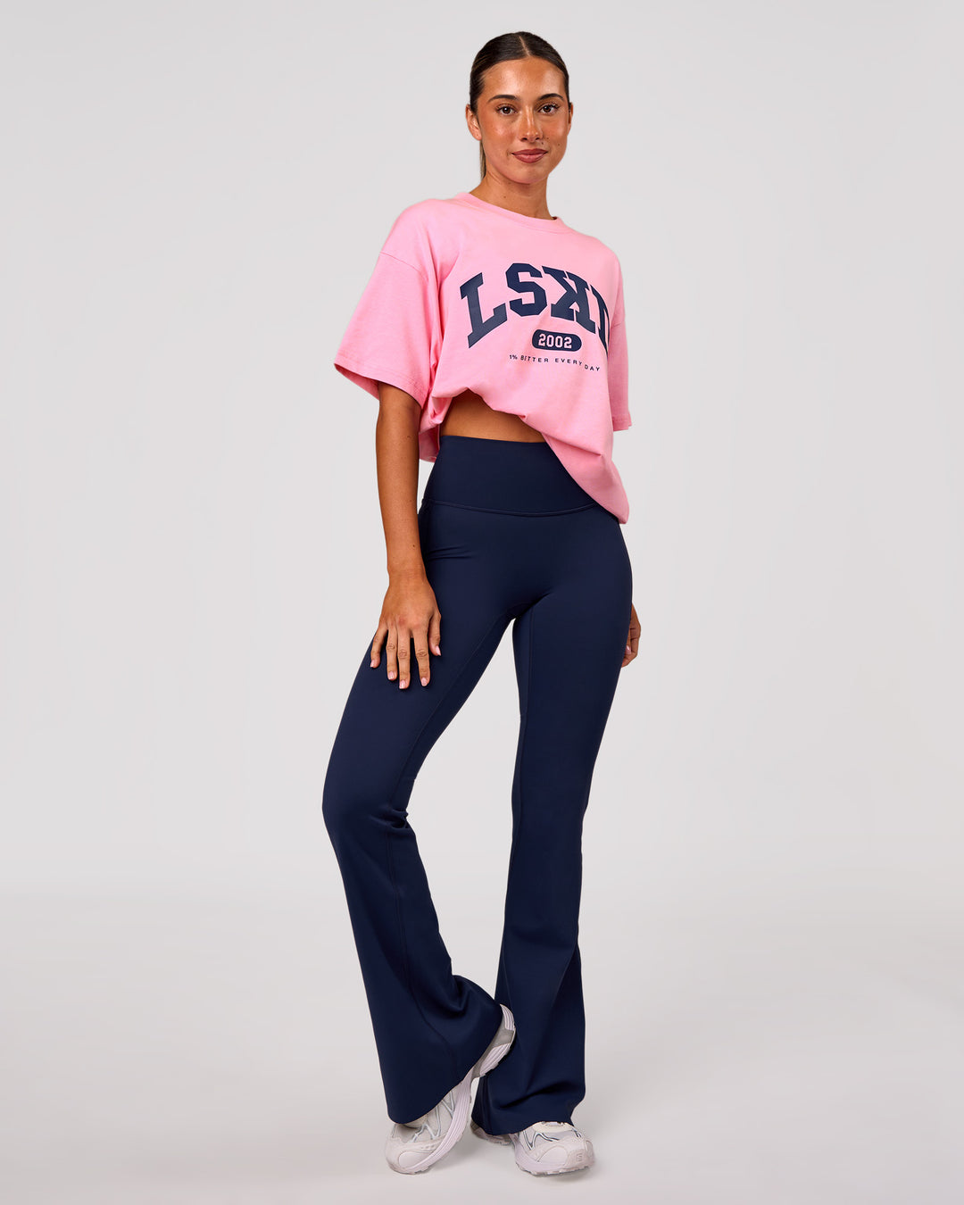 Woman wearing Varsity EST Heavyweight Oversized Tee  - Pink Rose-Future Navy | Model:Charli | Size:XS - view 6