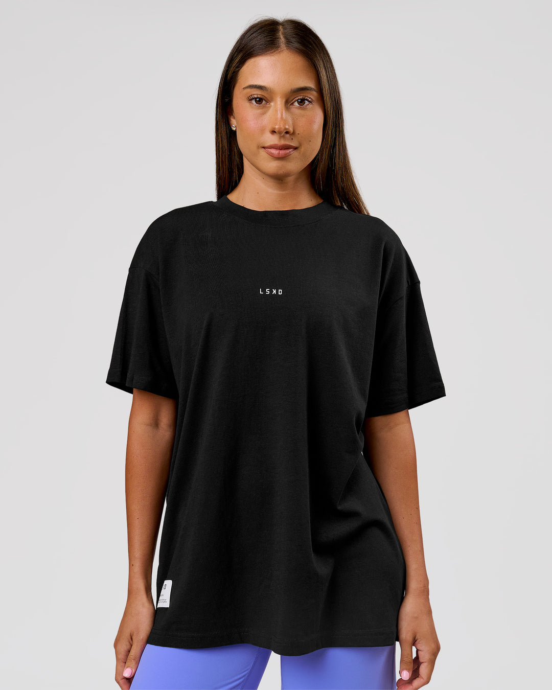 Woman wearing VS26 1% Better FLXCotton Oversize Tee - Black-White | Model:Charli | Size:XS - view 6