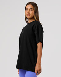 Woman wearing VS26 1% Better FLXCotton Oversize Tee - Black-White | Model:Charli | Size:XS | Thumbnail Index: 8