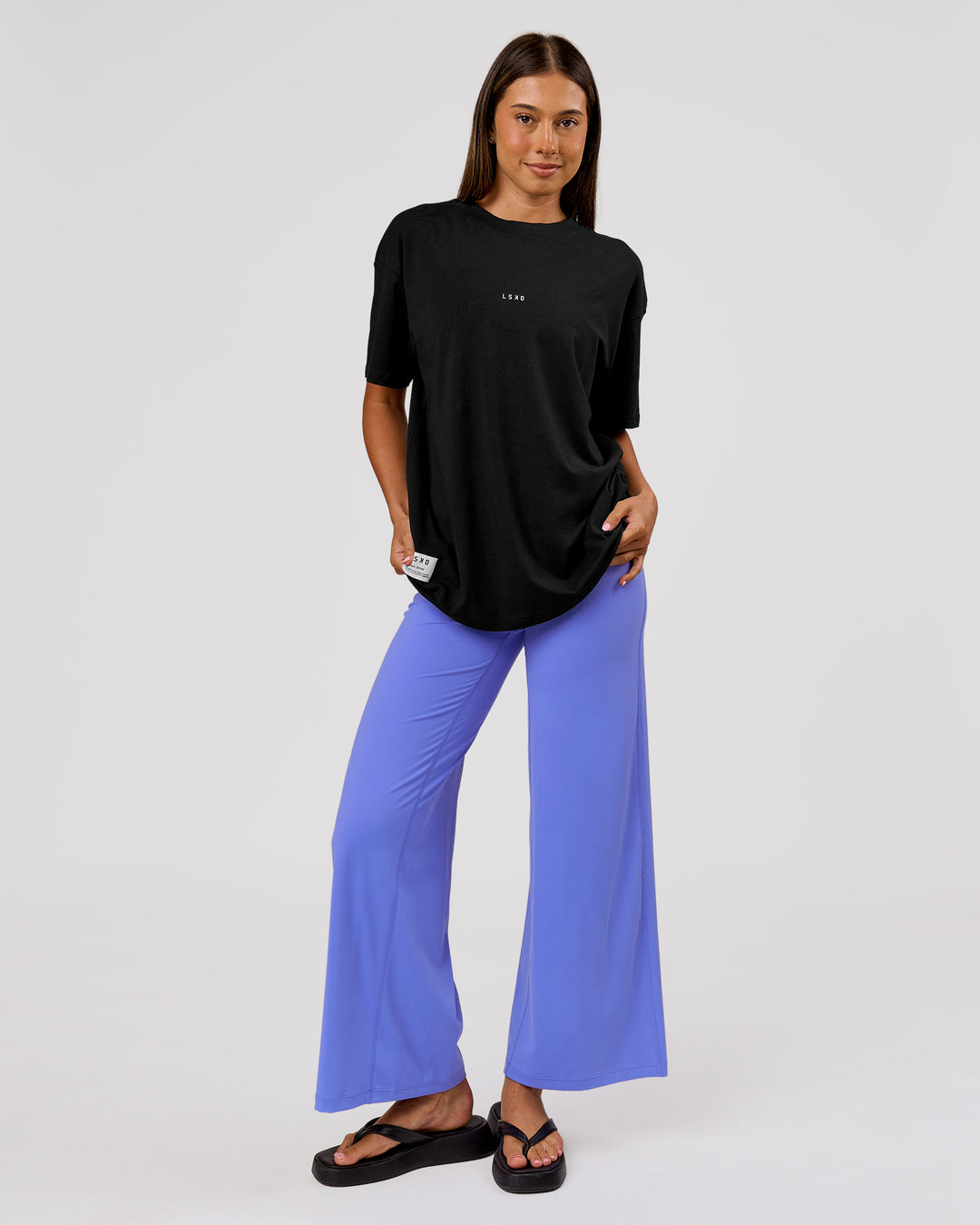 Woman wearing VS26 1% Better FLXCotton Oversize Tee - Black-White | Model:Charli | Size:XS - view 11