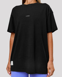 Woman wearing VS26 1% Better FLXCotton Oversize Tee - Black-White | Model:Charli | Size:XS | Thumbnail Index: 15