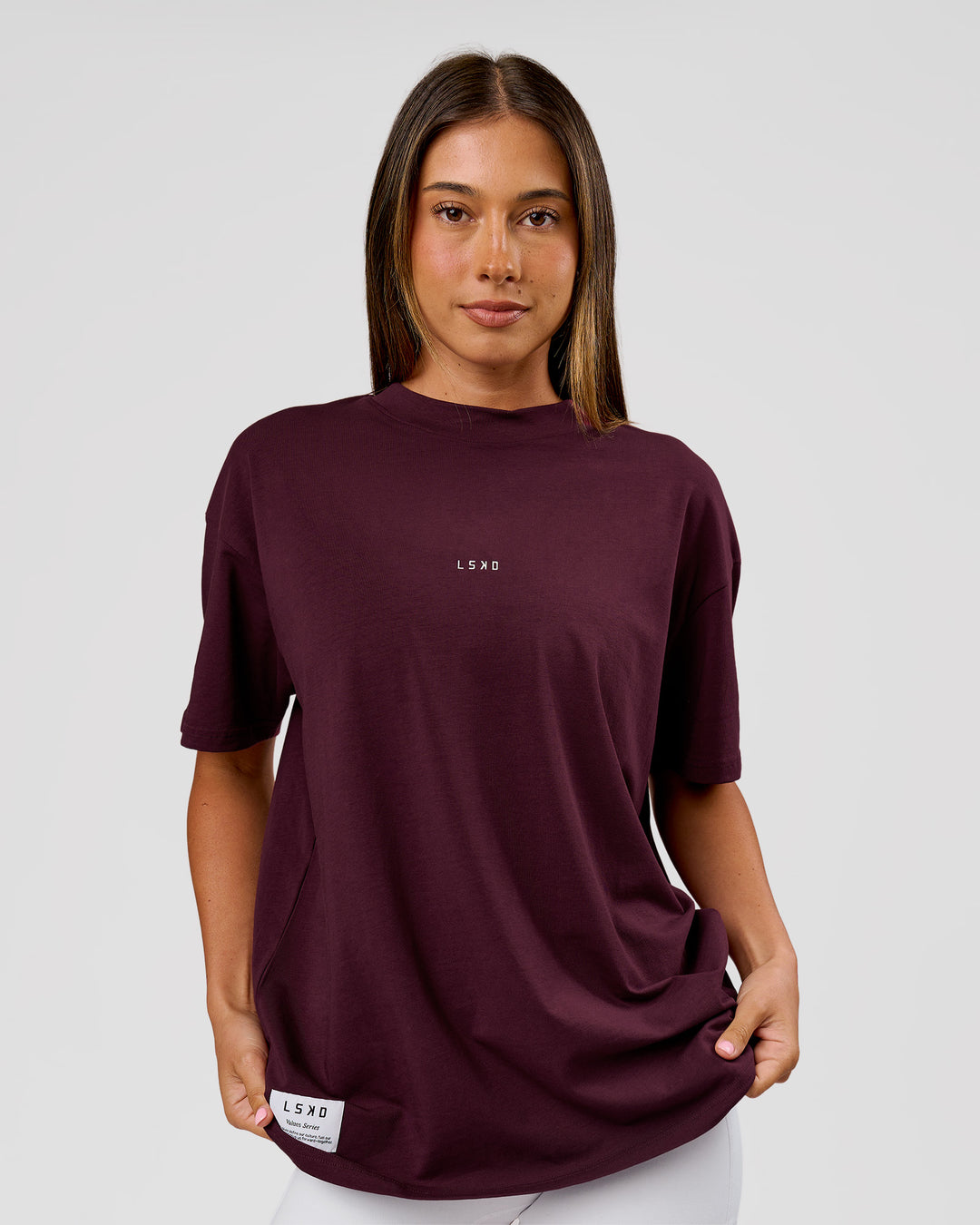 Woman wearing VS26 1% Better FLXCotton Oversize Tee - Cherry Lacquer-Off White | Model:Charli | Size:XS - view 18