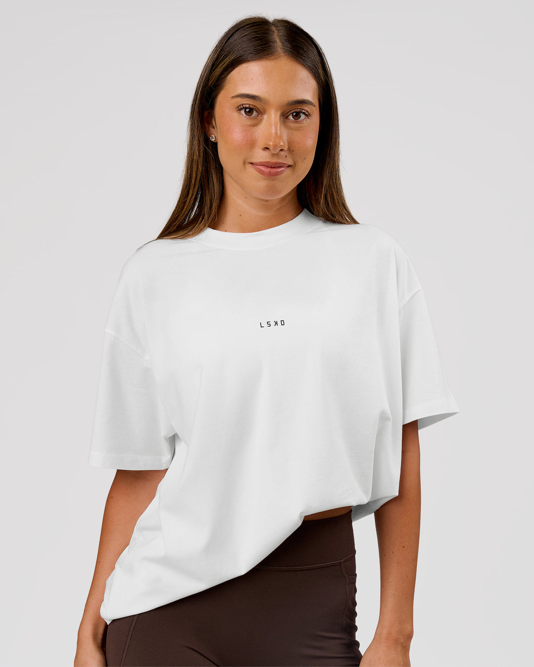 Woman wearing VS26 1% Better FLXCotton Oversize Tee - White-Black | Model:Charli | Size:XS - view 6