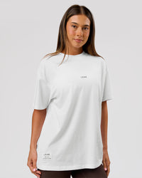 Woman wearing VS26 1% Better FLXCotton Oversize Tee - White-Black | Model:Charli | Size:XS | Thumbnail Index: 12