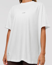 Woman wearing VS26 1% Better FLXCotton Oversize Tee - White-Black | Model:Charli | Size:XS | Thumbnail Index: 14