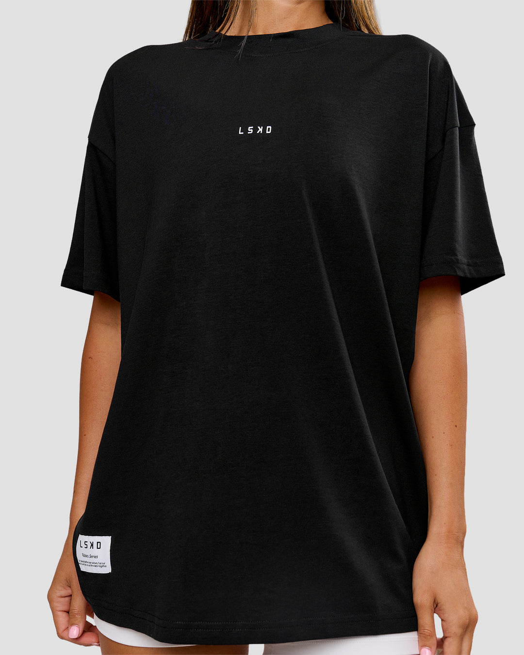 Woman wearing VS26 Journey FLXCotton Oversize Tee - Black-White | Model:Charli | Size:XS - view 6