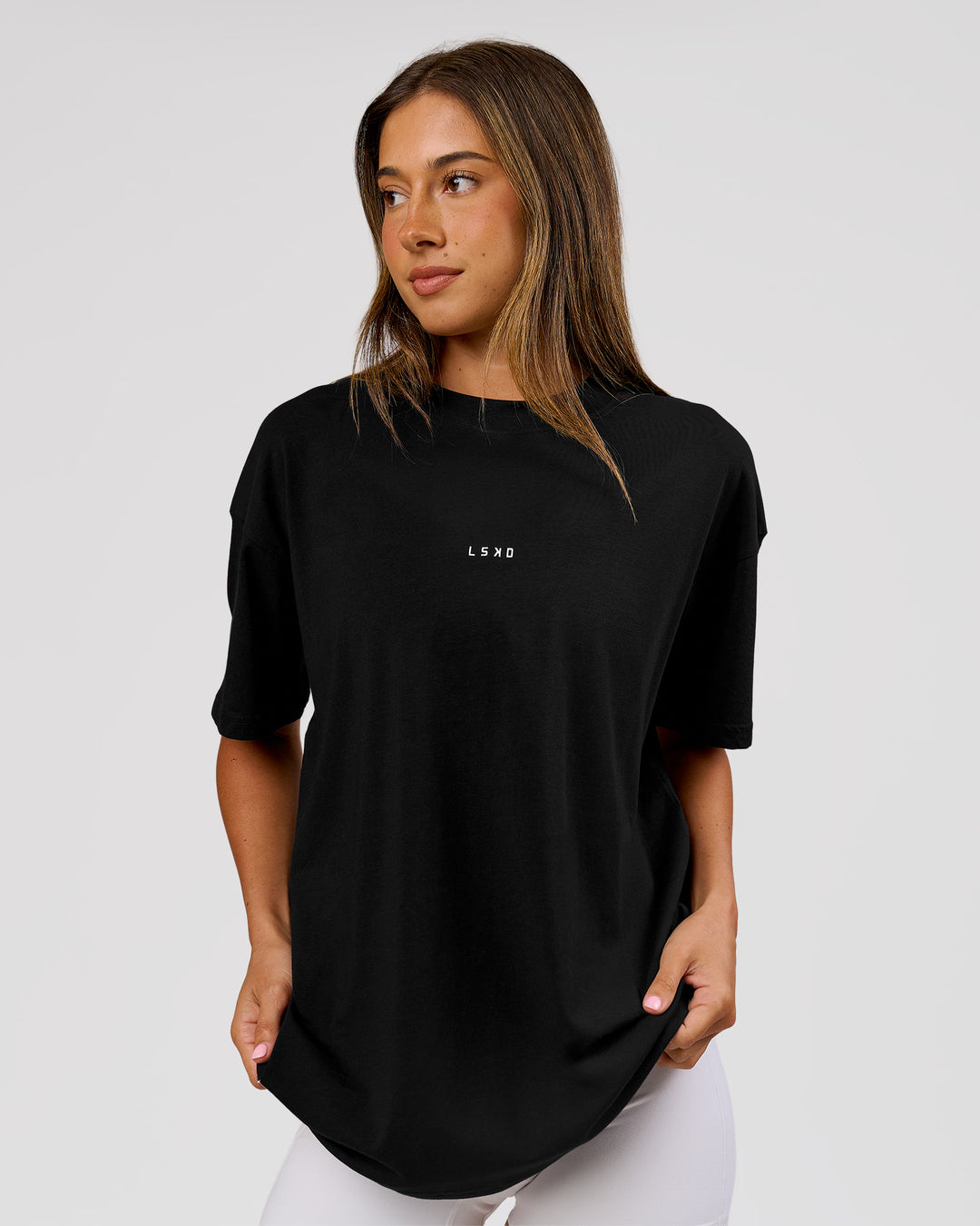 Woman wearing VS26 Journey FLXCotton Oversize Tee - Black-White | Model:Charli | Size:XS - view 8