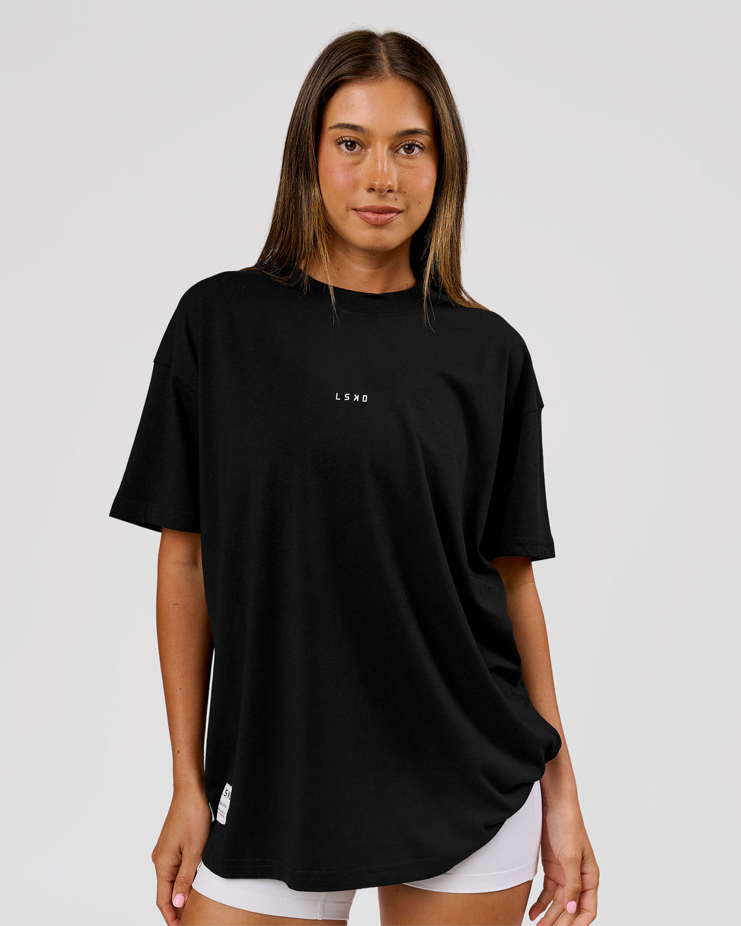 Woman wearing VS26 Journey FLXCotton Oversize Tee - Black-White | Model:Charli | Size:XS - view 10