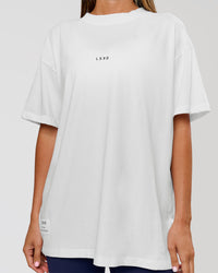 Woman wearing VS26 Journey FLXCotton Oversize Tee - White-Black | Model:Charli | Size:XS | Thumbnail Index: 13