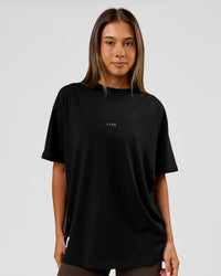 Woman wearing VS26 MFBS FLXCotton Oversize Tee - Black-White | Model:Charli | Size:XS | Thumbnail Index: 5