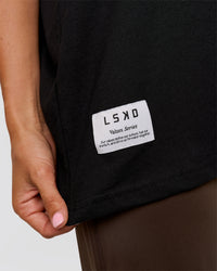 Woman wearing VS26 MFBS FLXCotton Oversize Tee - Black-White | Model:Charli | Size:XS | Thumbnail Index: 10