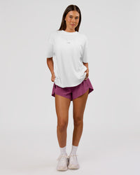 Woman wearing VS26 MFBS FLXCotton Oversize Tee - White-Black | Model:Charli | Size:XS | Thumbnail Index: 11