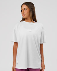 Woman wearing VS26 MFBS FLXCotton Oversize Tee - White-Black | Model:Charli | Size:XS | Thumbnail Index: 14