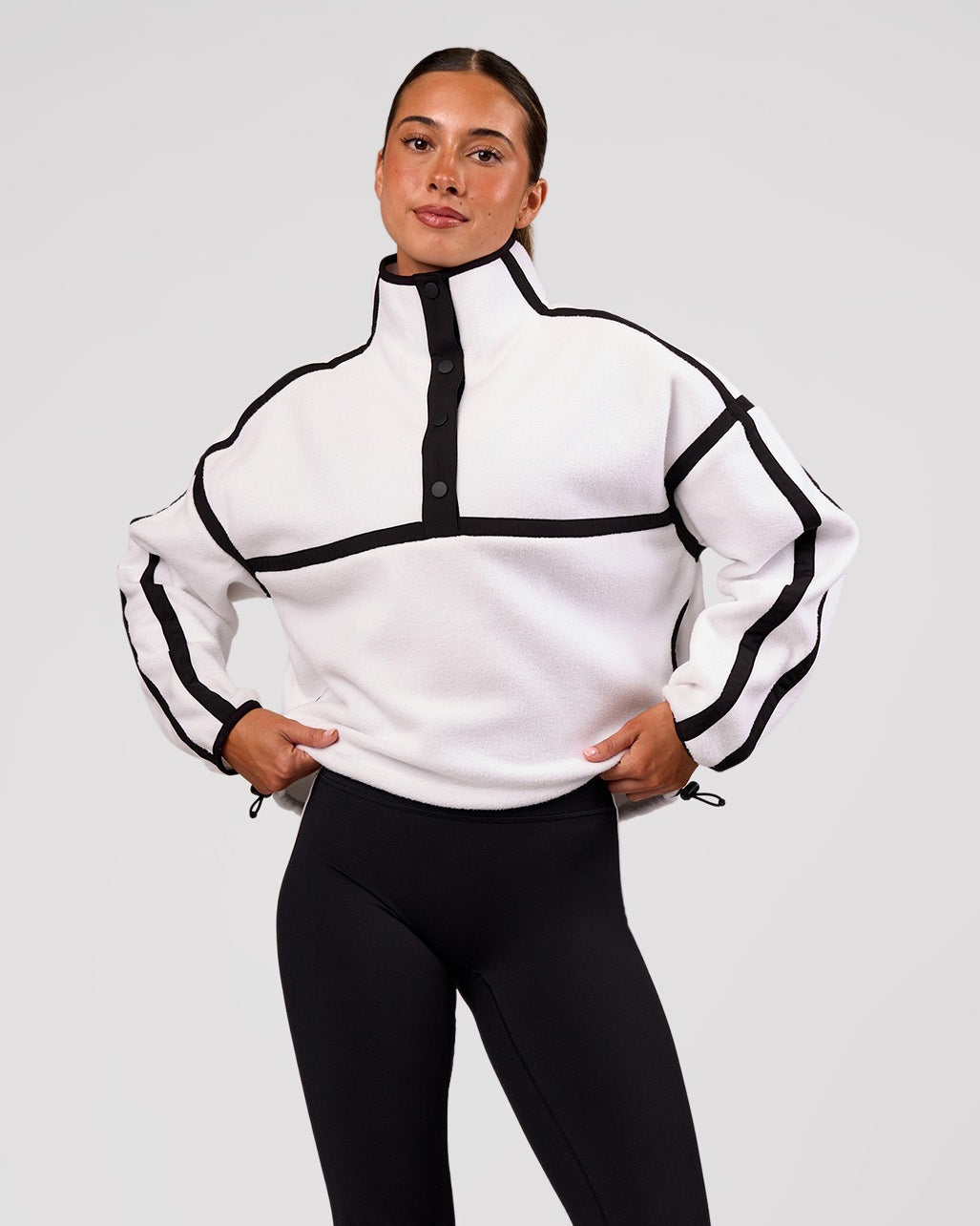 Woman wearing Expedition Pop Over - White-Black | Model:Charli | Size:XS