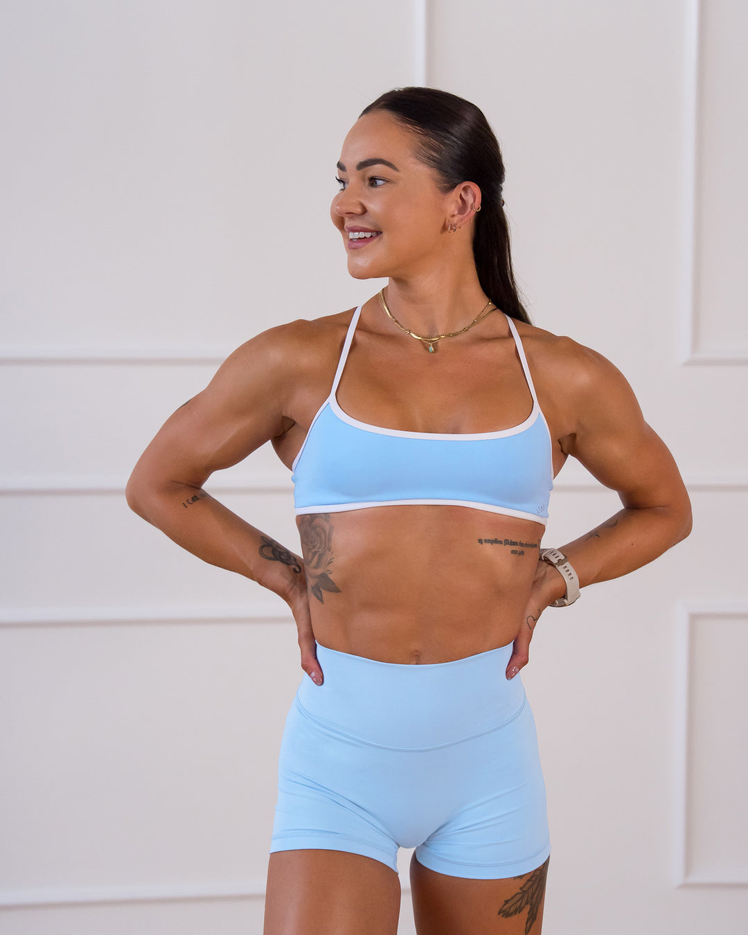Woman wearing Strong is Beautiful Fusion High-Rise 4" Short - Open Air | Model:Charlotte | Size:XS - view 4