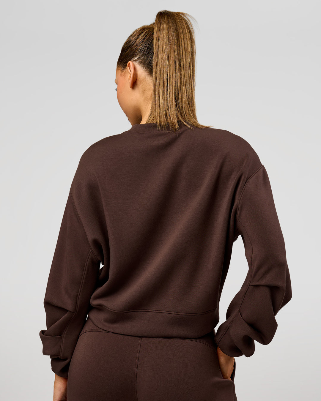 Woman wearing Elevate SoftTouch Draped Sleeve Sweater - Hot Chocolate | Model:Claire | Size:XS - view 2