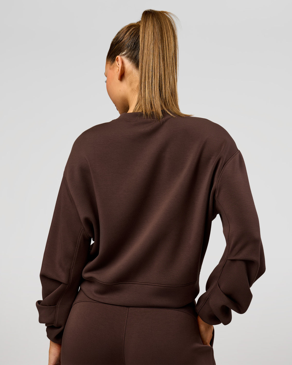 Woman wearing Elevate SoftTouch Draped Sleeve Sweater - Hot Chocolate | Model:Claire | Size:XS