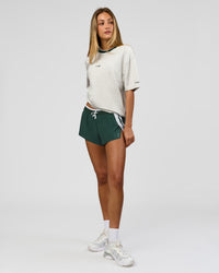 Woman wearing Be Here Now Heavyweight FLXCotton Tee Oversize - Silver Marl-Midnight Green | Model:Georgia | Size:XS | Thumbnail Index: 15