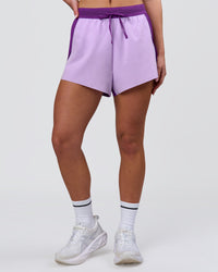 Woman wearing Accelerate 3" High-Rise Running Short - Chloe Purple | Model:Issy | Size:XS | Thumbnail Index: 11
