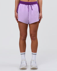 Woman wearing Accelerate 3" High-Rise Running Short - Chloe Purple | Model:Issy | Size:XS | Thumbnail Index: 12