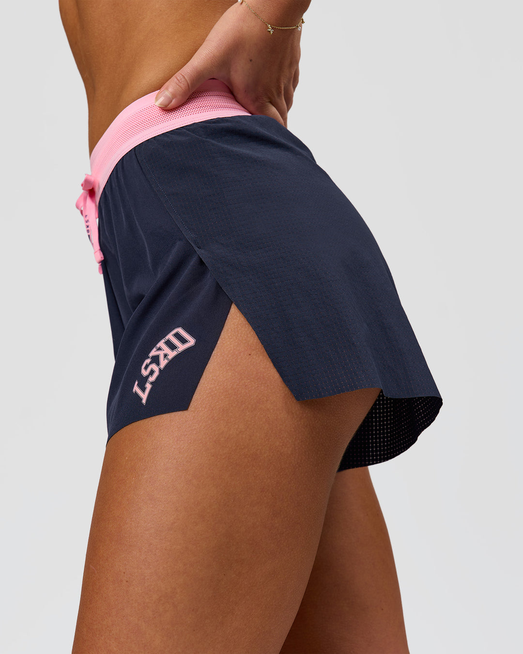Woman wearing Accelerate 3" High-Rise Running Short - Future Navy-Varsity print | Model:Issy | Size:XS - view 7