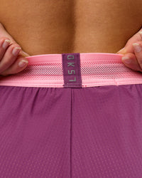 Woman wearing Accelerate 3" High-Rise Running Short - Boysenberry-Pink Rose | Model:Issy | Size:XS | Thumbnail Index: 9