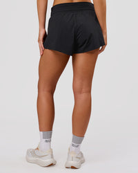 Woman wearing Accelerate Synergy 3" Running Short Short - Black-Black | Model:Issy | Size:XS | Thumbnail Index: 9