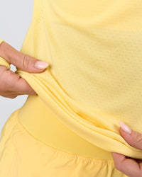 Woman wearing AeroFLX+ Long Sleeve Half Zip - Lemon/Lemon | Model:Issy | Size:XS | Thumbnail Index: 9