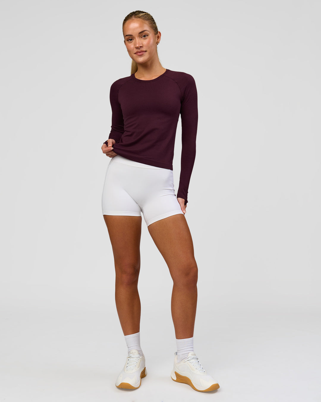 Woman wearing AeroFLX+ Seamless Long Sleeve Tee - Cherry Lacquer/Cherry Lacquer | Model:Issy | Size:XS - view 3