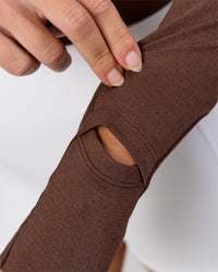 Woman wearing AeroFLX+ Long Sleeve Skimmer Half Zip - Hot Chocolate/Hot Chocolate | Model:Issy | Size:XS | Thumbnail Index: 11